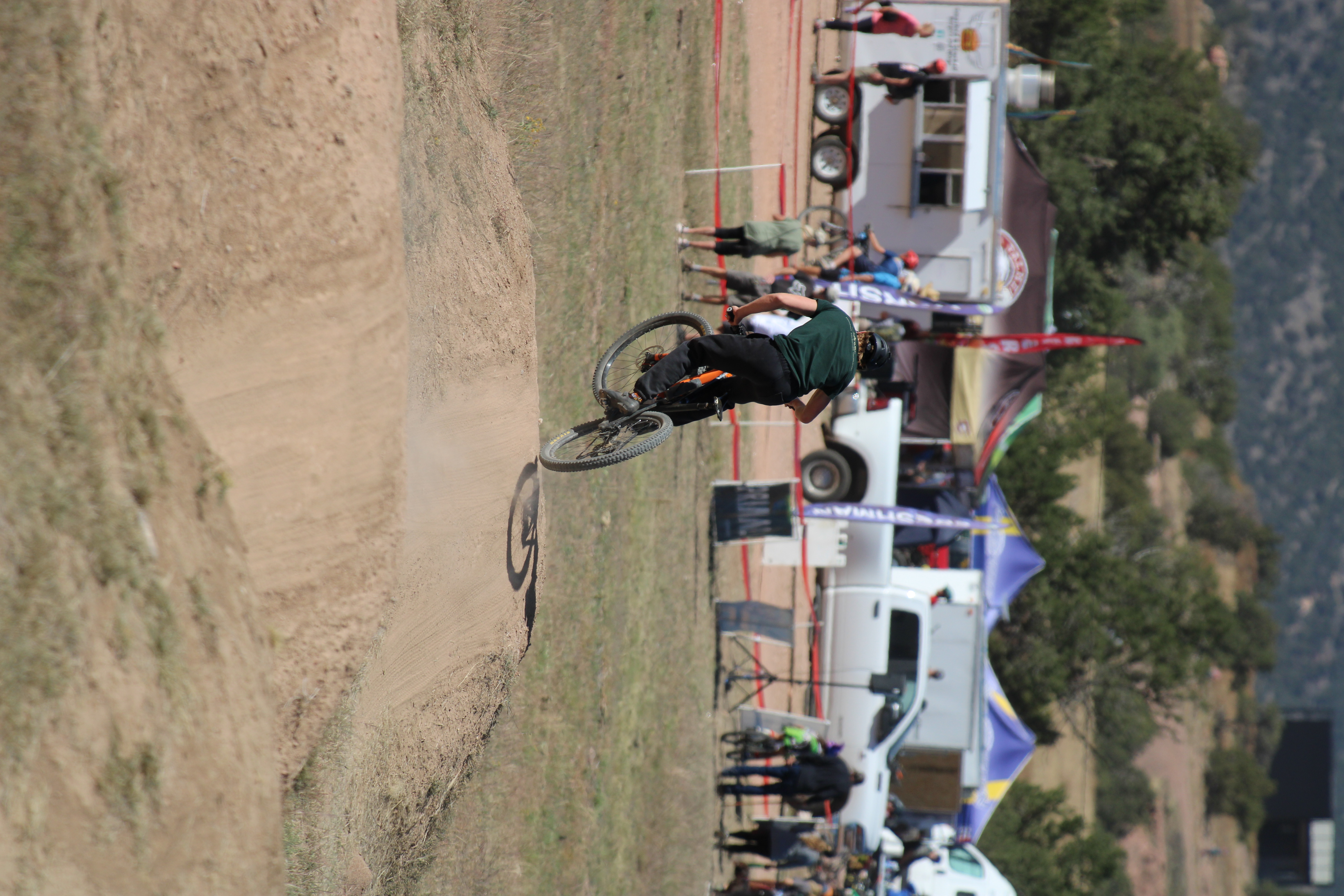 Cornering drill on a dusty berm